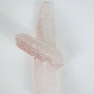 Lichtroze kaarsenkwarts punt “Blushing Whisper” met suikerlaag en overgroei